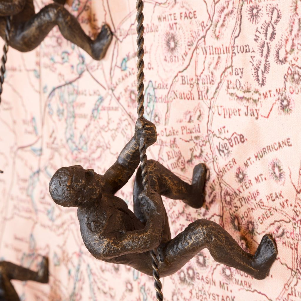 Iron Wall Climber Sculpture