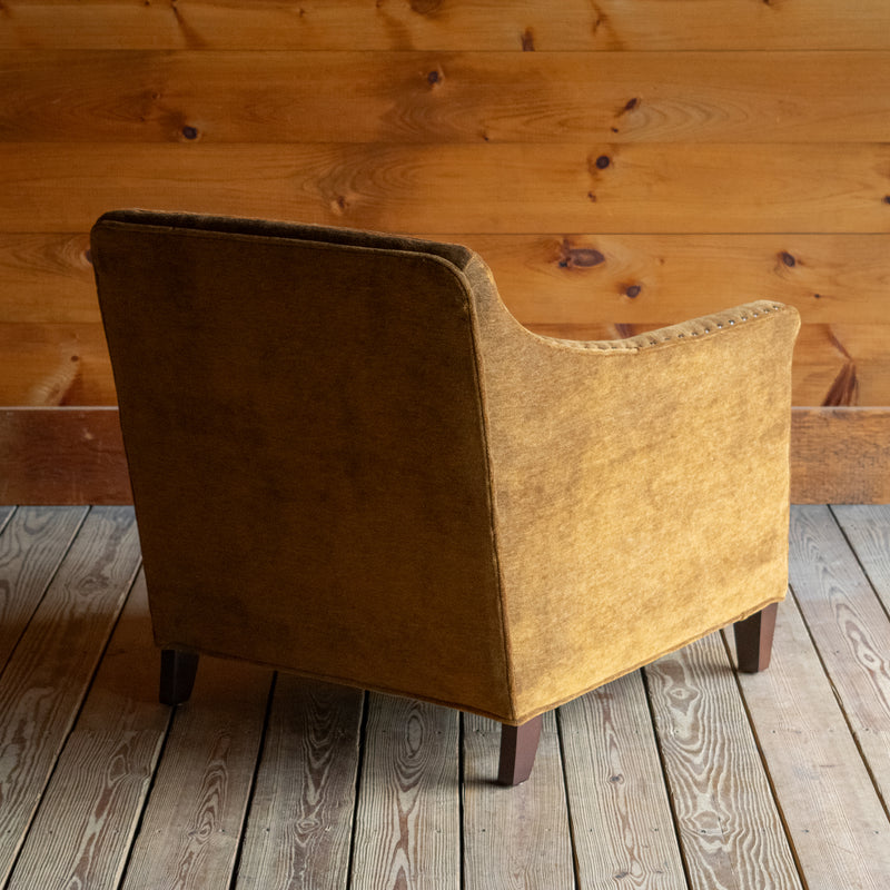 Sloped Arm Chair Upholstered in Brassy Umber Mohair Fabric with Tight Back, Nailhead Trim, and Tapered Legs, Angled Back View