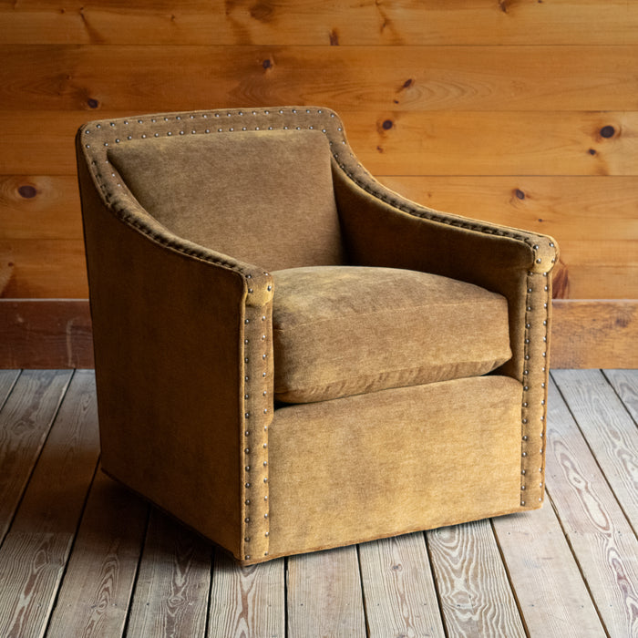 Sloped Arm Swivel Chair Upholstered in Brassy Umber Mohair Fabric with Tight Back and Nailhead Trim, Angled Front View