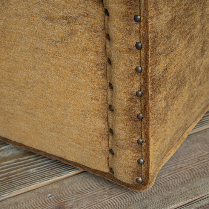 Sloped Arm Swivel Chair Upholstered in Brassy Umber Mohair Fabric with Tight Back and Nailhead Trim, Bottom Corner Detail