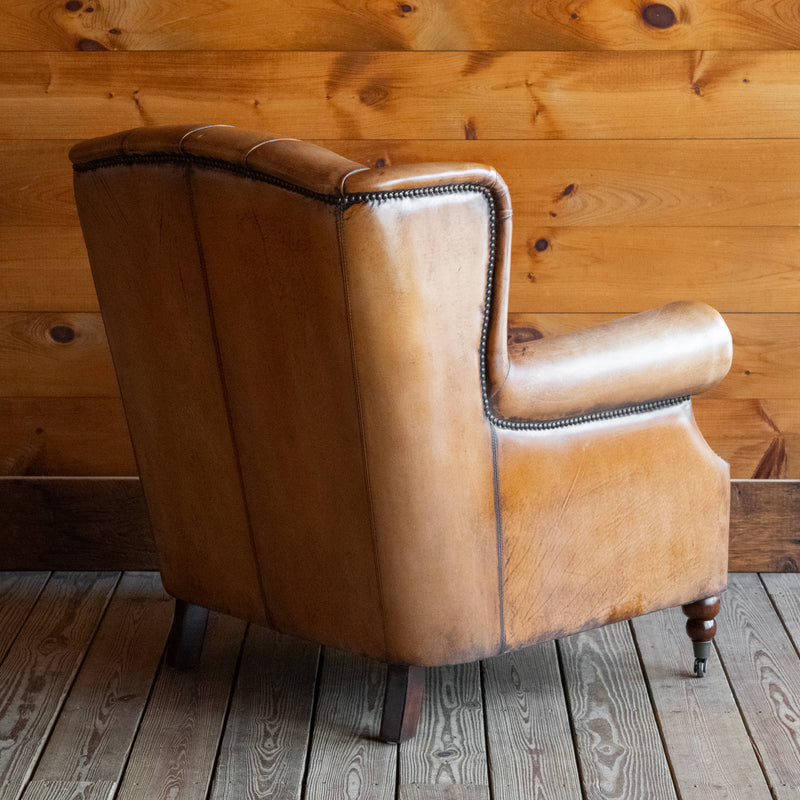 Buffalo Leather Tufted Wing Back Chair with Nailhead Trim, Angled Back View