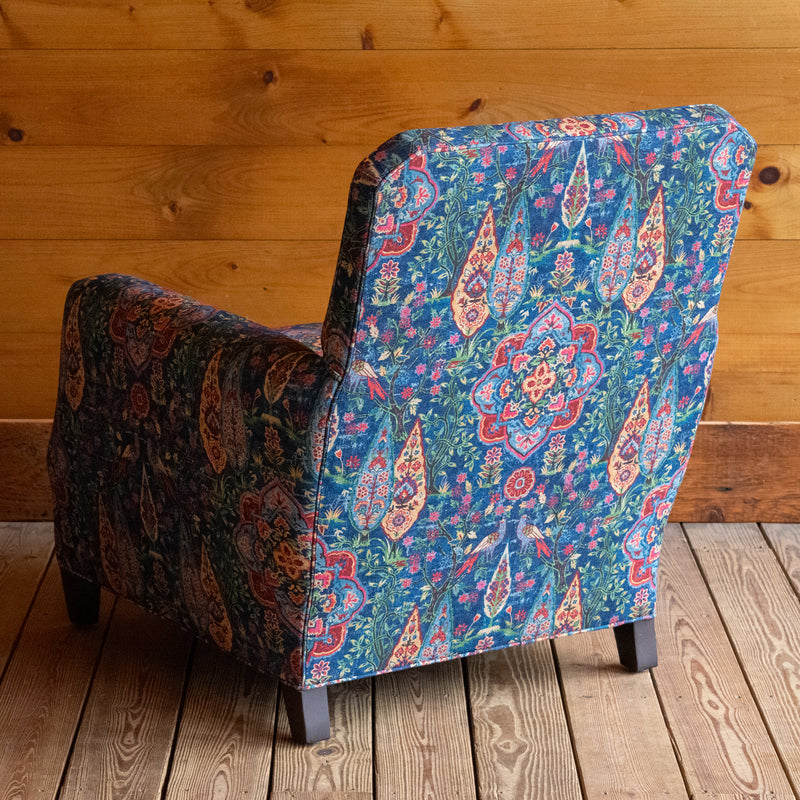 Rustic Club Chair Upholstered in Vibrant Fabric with Bird and Floral Motifs in Jewel Tones, Angled Back View