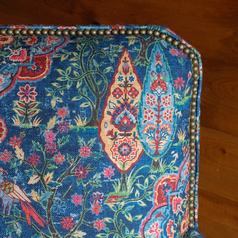 Rustic Club Chair Upholstered in Vibrant Fabric with Bird and Floral Motifs in Jewel Tones, Seatback Corner Detail