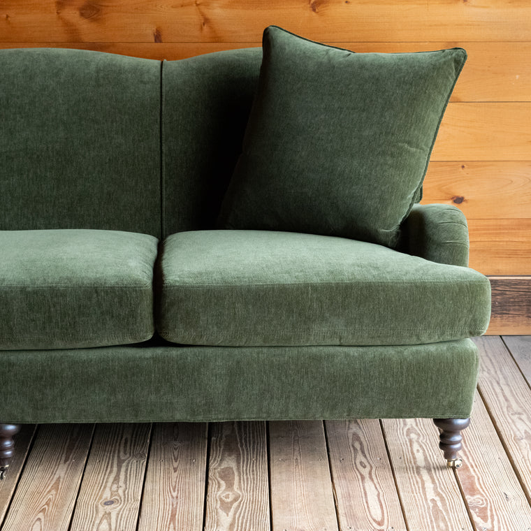 Classic English Roll Arm Sofa Upholstered in Green Velvet Chenille with Matching Down Throw Pillows, Angled Back View