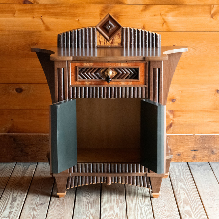 Small Highly Ornate Adirondack Style Cupboard with a Single Drawer and Double Doors, Profile View