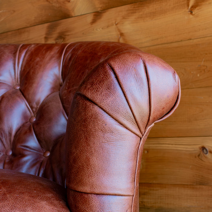 Tufted Leather Sofa, Pleated Arm Detail