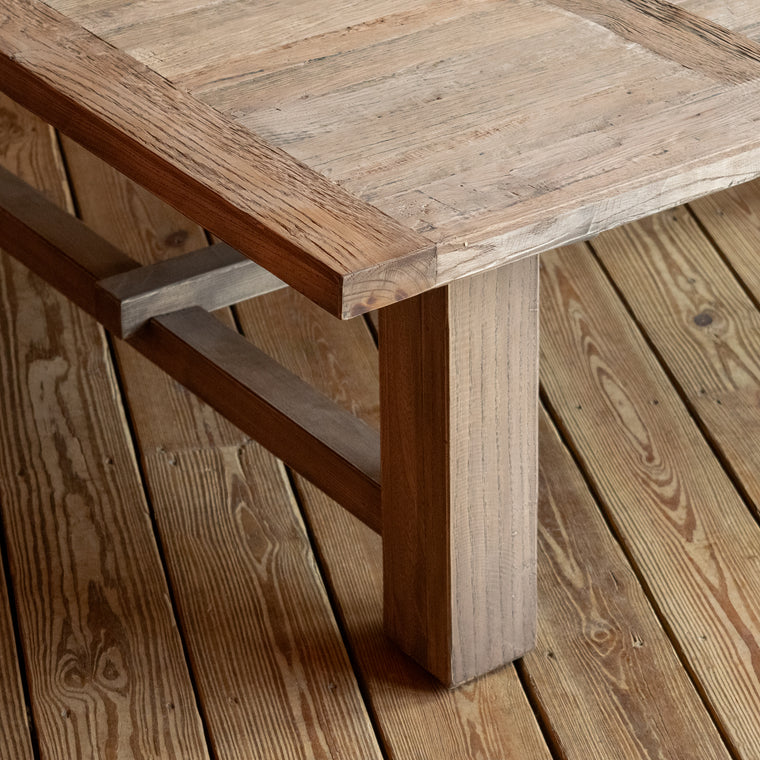 Close-up of the tabletop of a rectangular reclaimed oak coffee table