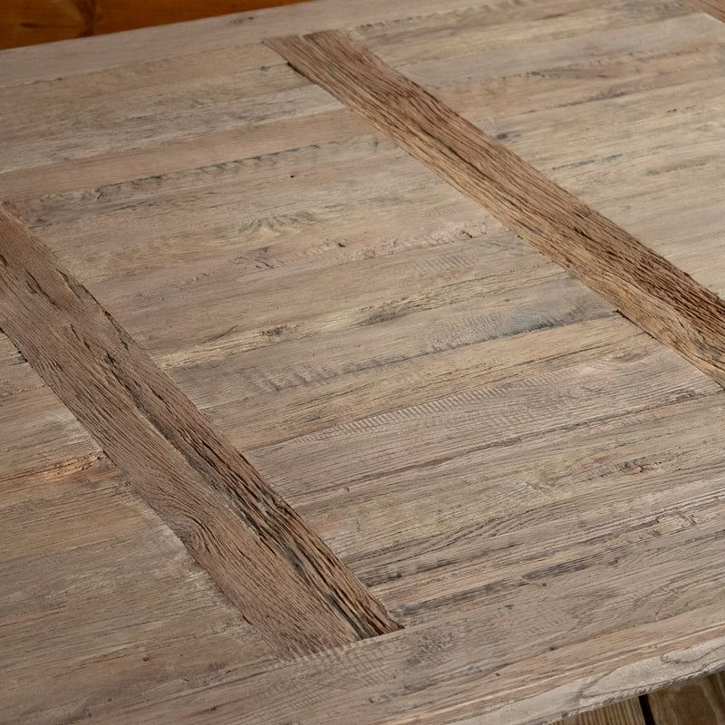 Close-up of the tabletop of a rectangular reclaimed oak coffee table