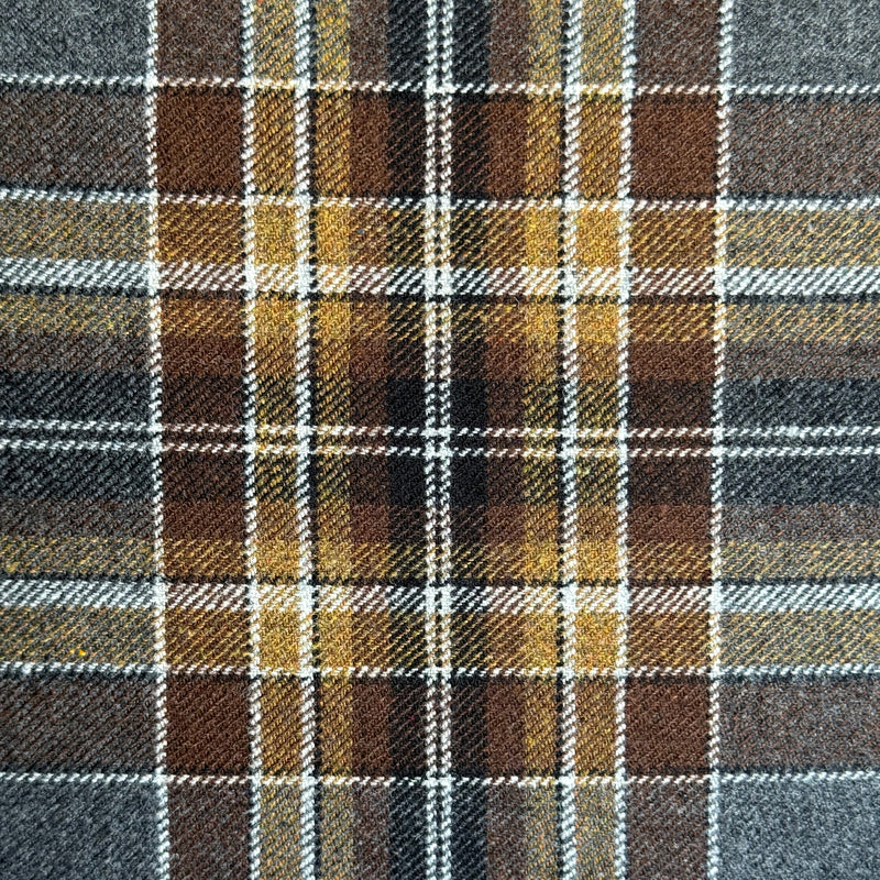 Close-up of classic steel blue, gold, and brown plaid fabric
