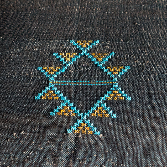 Close-up of hand-embroidered Moroccan cactus silk fabric