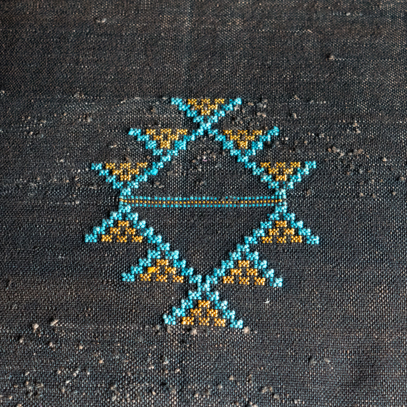 Close-up of hand-embroidered Moroccan cactus silk fabric