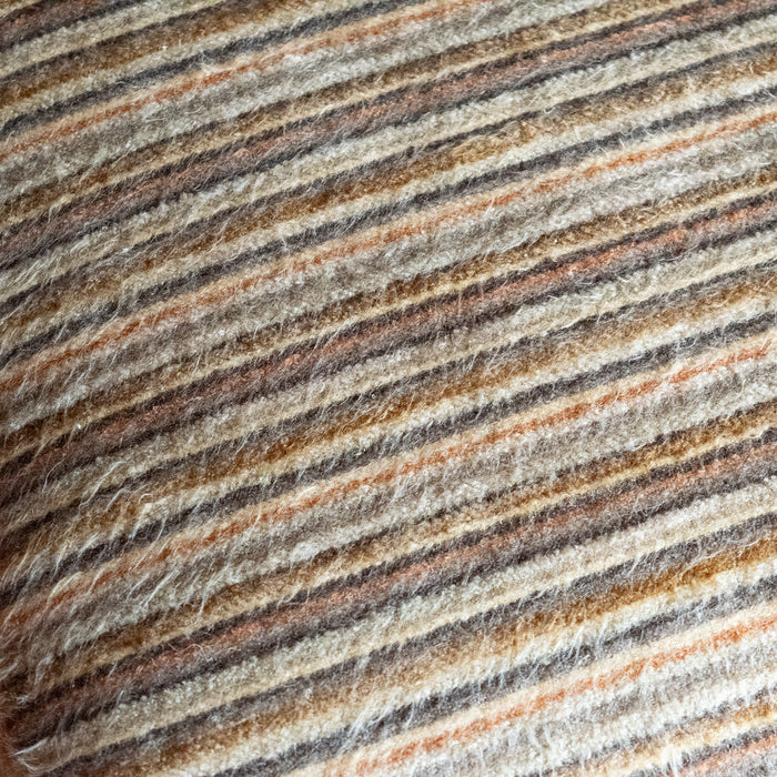 Close-up of the striped cushion