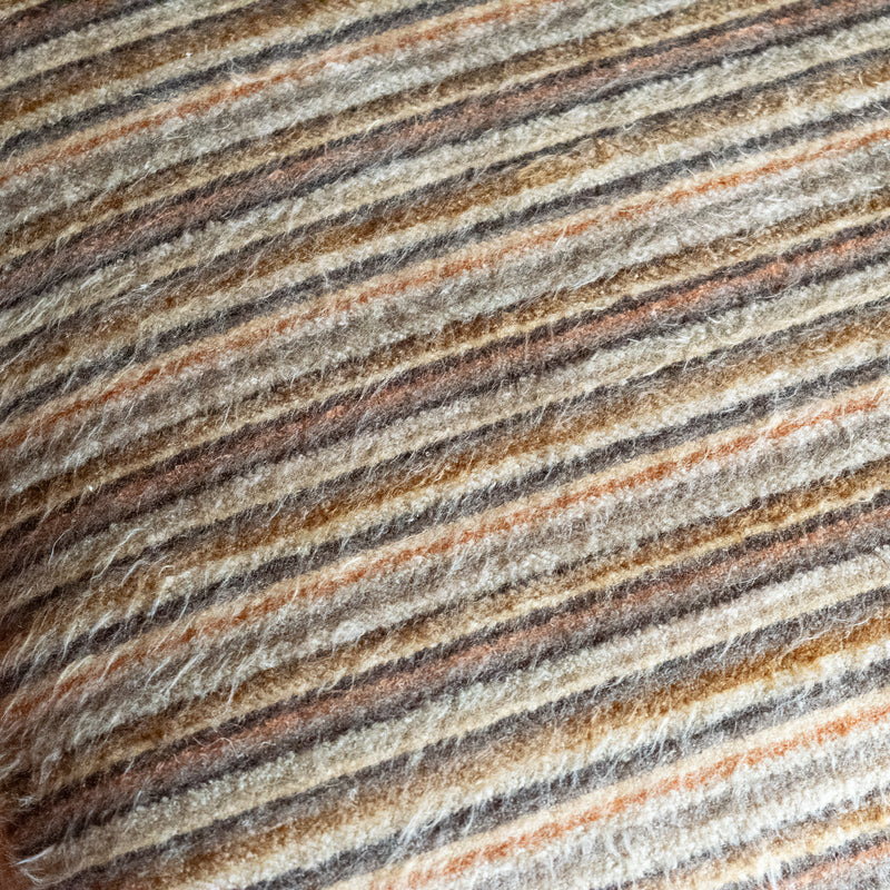 Close-up of the striped cushion