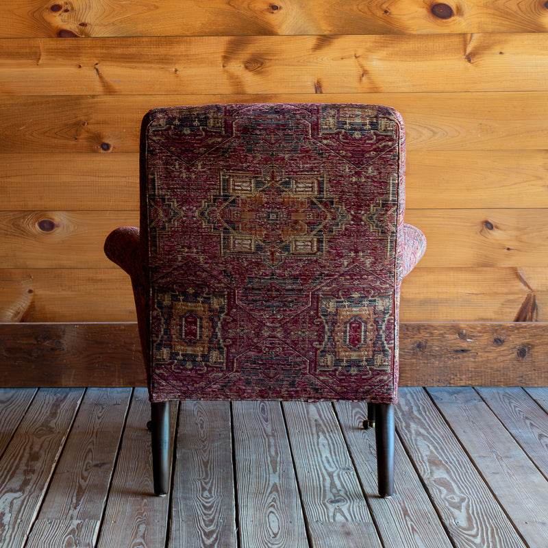 Red Rug Pattern Chair With Pleated Roll Arms and Casters, Back View