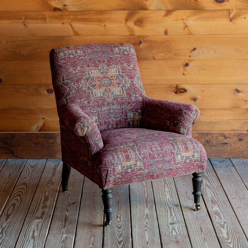Red Rug Pattern Chair With Roll Arms and Casters