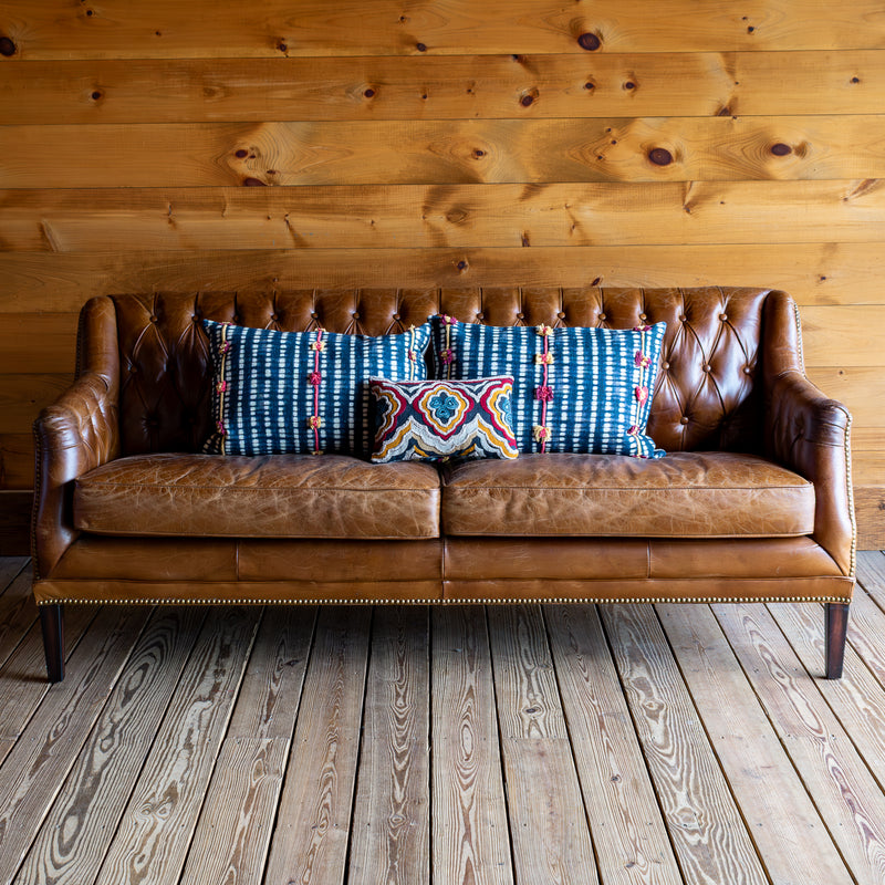 Tufted Distressed Brown Leather Sofa, Styled With Cotton Slub Printed Pillows