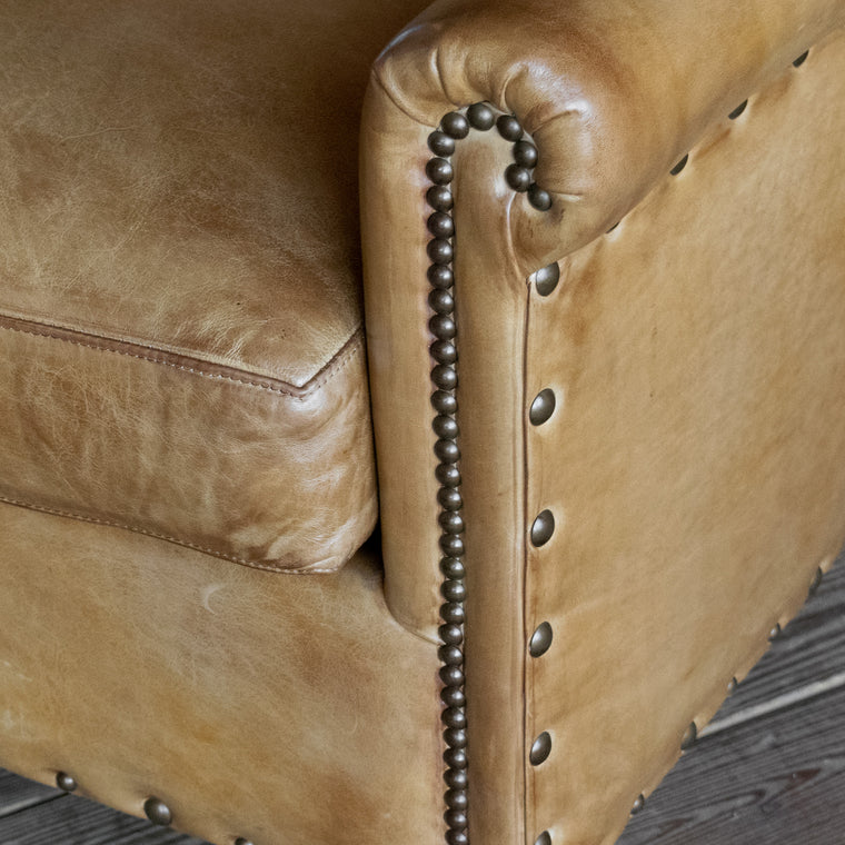 Rustic Caramel Burnished Leather Chair with Tight Back, Rolled Arms, Nailhead Trim, and Hardwood Frame