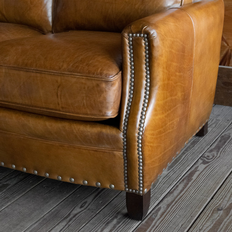 Three Seat Sofa Upholstered in Burnished Walnut Leather with Nailhead Trim and Down Seat and Back Cushions