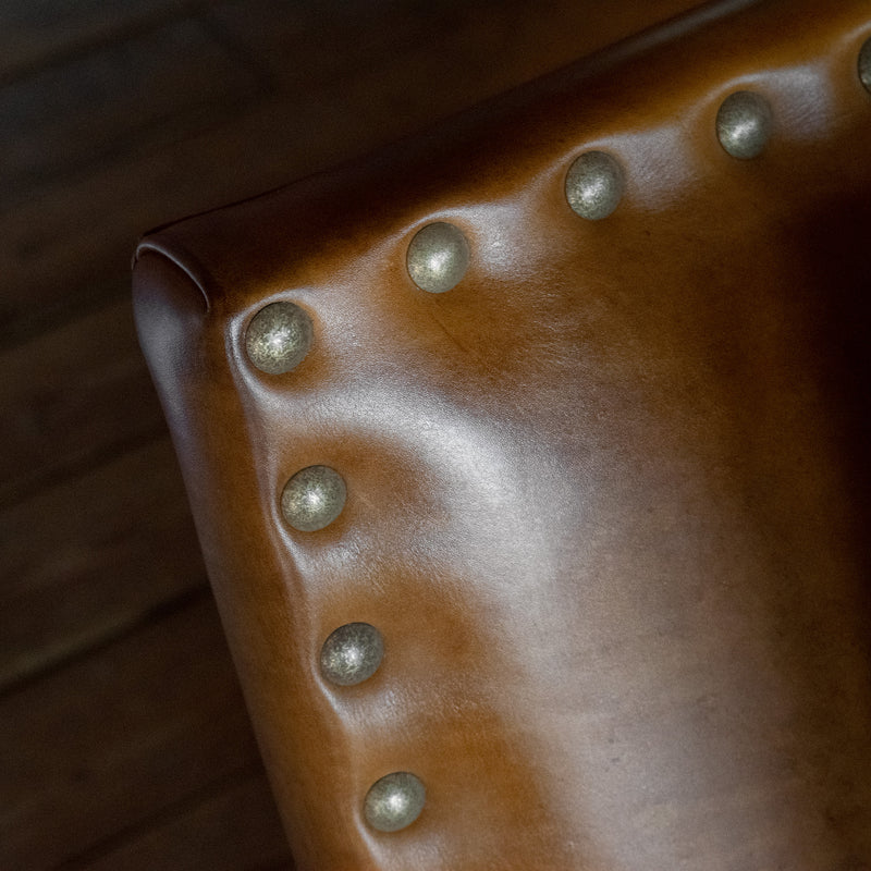 Three Seat Sofa Upholstered in Burnished Walnut Leather with Nailhead Trim and Down Seat and Back Cushions