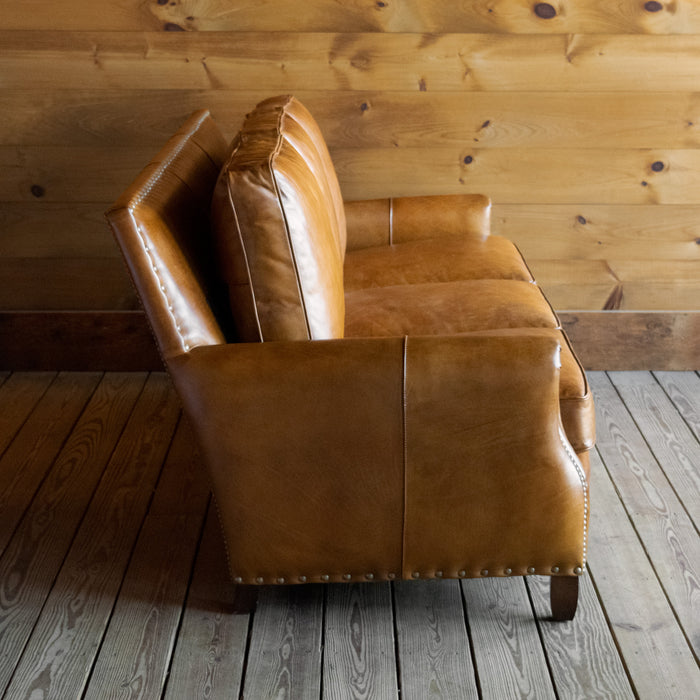 Three Seat Sofa Upholstered in Burnished Walnut Leather with Nailhead Trim and Down Seat and Back Cushions