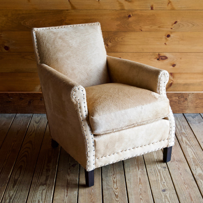 Cowhide Arm Chair with Cut Nail Trim and Wooden Legs