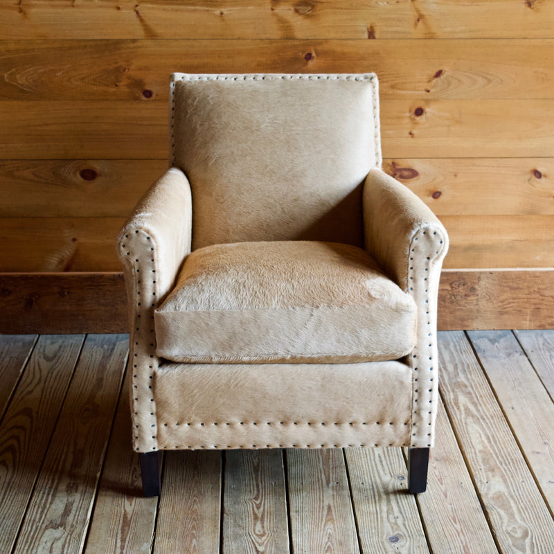 Cowhide Arm Chair with Cut Nail Trim and Wooden Legs