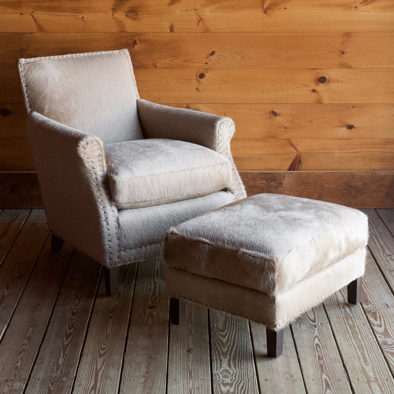 Rustic Arm Chair & Ottoman Upholstered in Cowhide Leather with Tack Trim