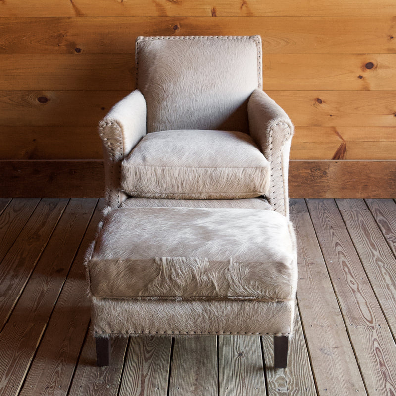 Rustic Arm Chair & Ottoman Upholstered in Cowhide Leather with Tack Trim
