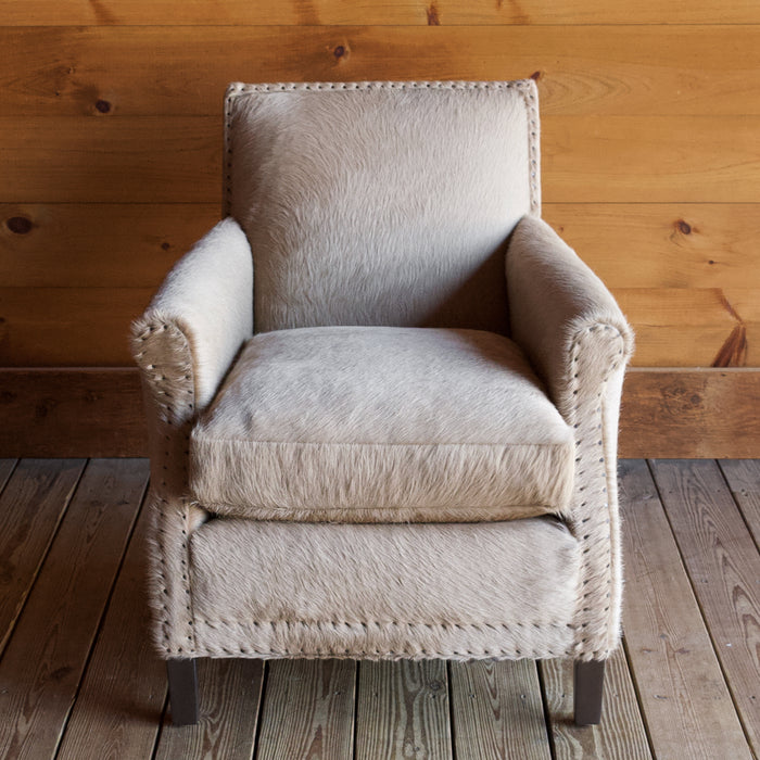 Rustic Arm Chair & Ottoman Upholstered in Cowhide Leather with Tack Trim