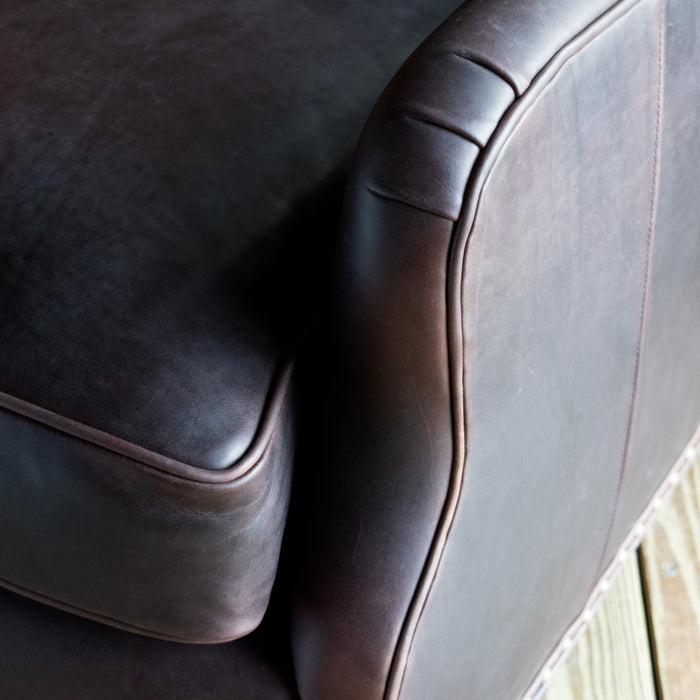 Lounge Chair and Ottoman Upholstered in Dark Mahogany Full-Grain Leather with Nailhead Trim