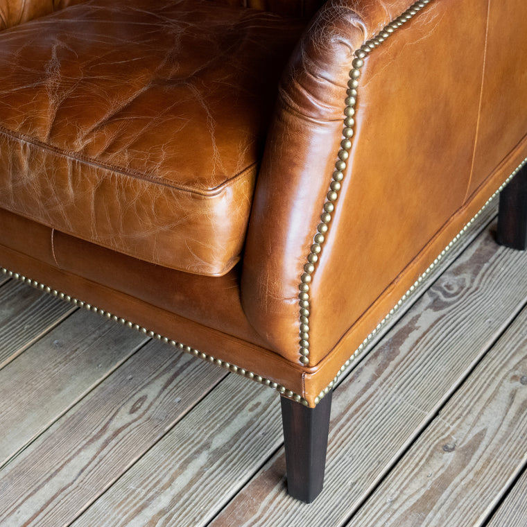 Vintage Cigar Leather Chair with Button Tufting, Solid Wood Frame, and Rustic Nailhead Trim