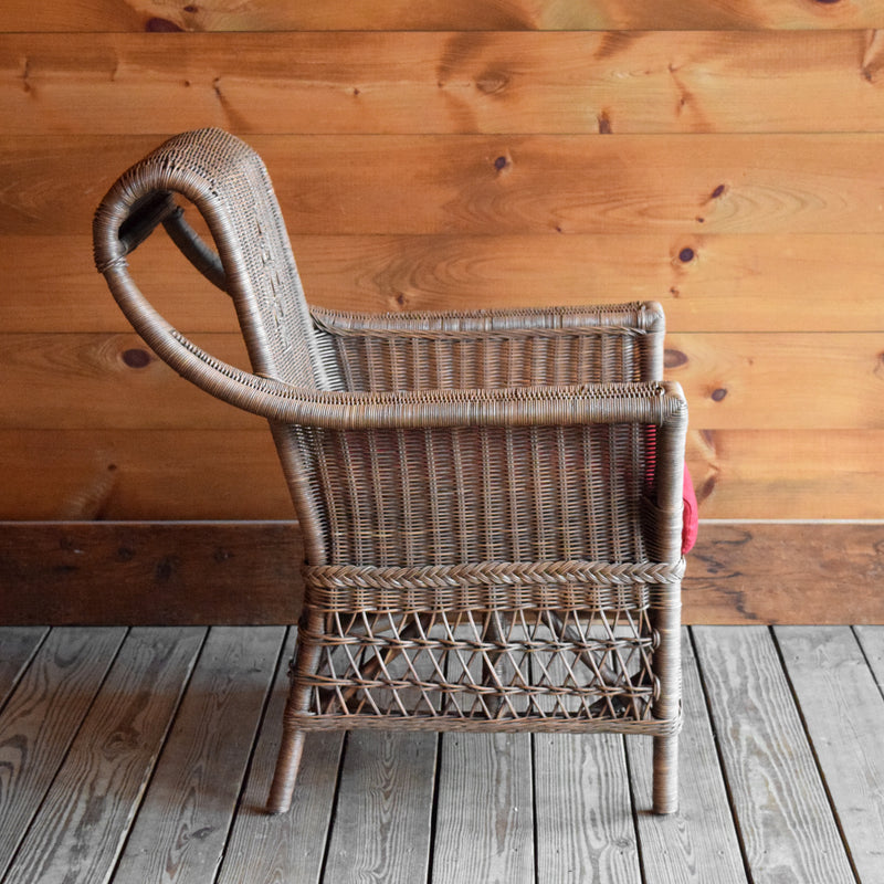 Natural Wicker Arm Chair with Swooping Back and Red Cushion