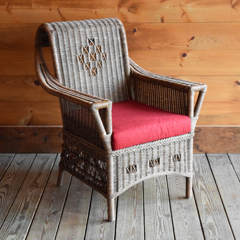 Natural Wicker Arm Chair with Swooping Back and Red Cushion