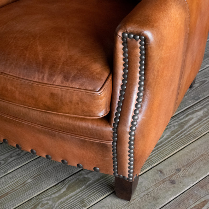 Distressed Cognac Leather Lounge Chair with Rustic Nailhead Trim and Hardwood Frame