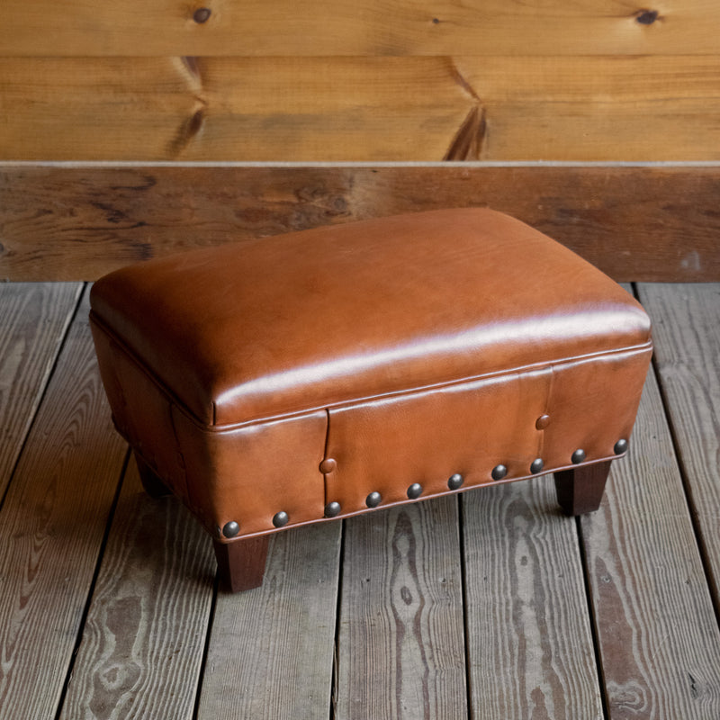 Distressed Cognac Leather Ottoman with Rustic Nailhead Trim and Hardwood Frame