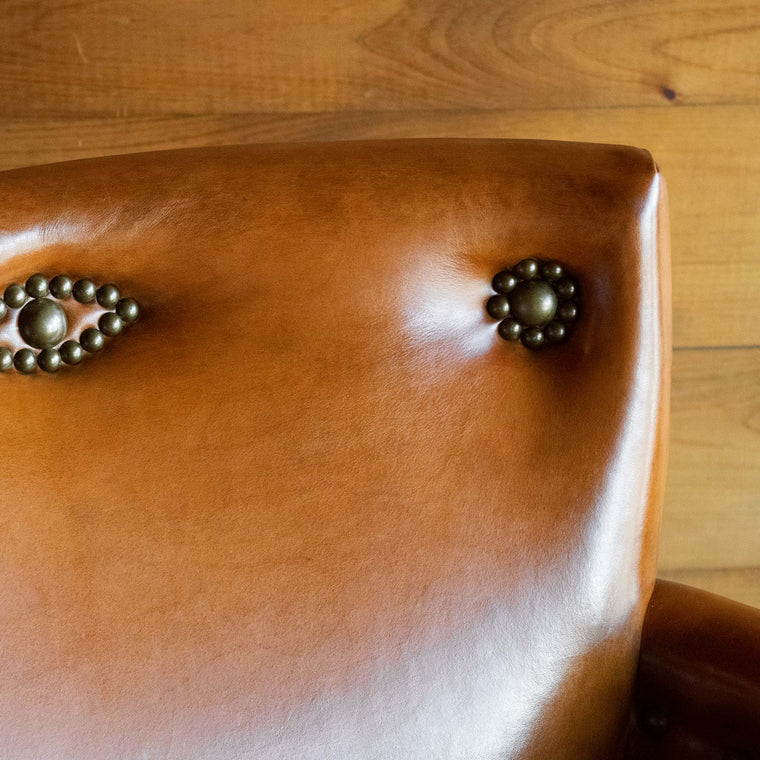 Southwestern-Inspired Rustic Burnished Leather Arm Chair with Decorative Nailhead Trim