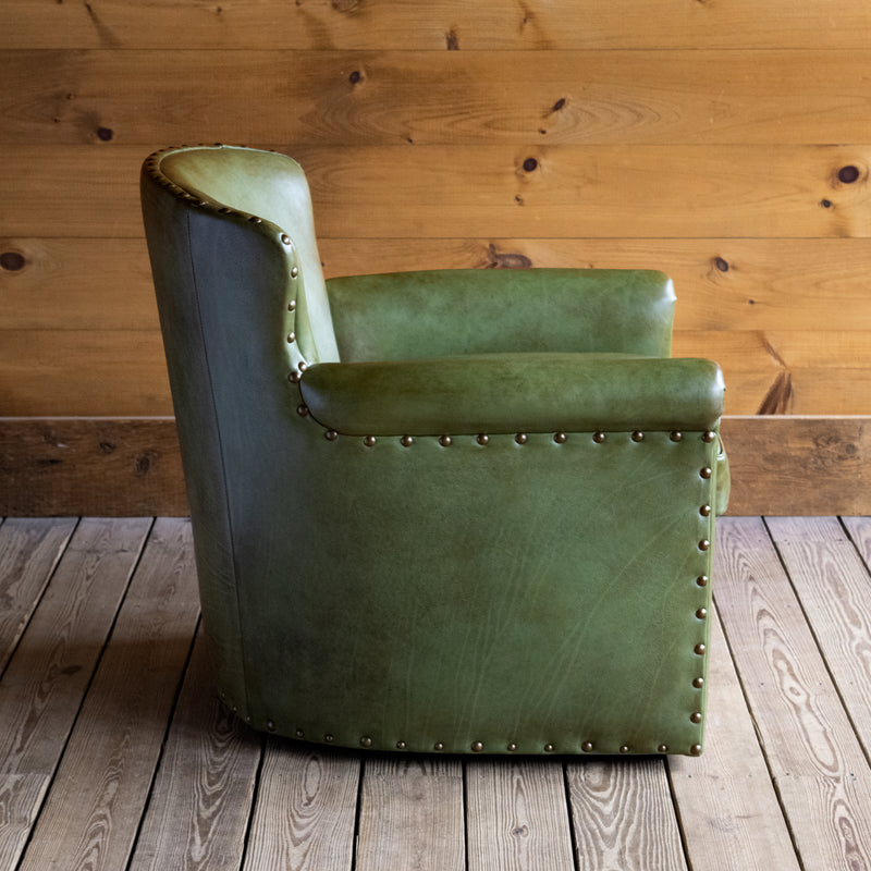 Rustic Green Leather Swivel Chair with Rolled Arms and Decorative Nailhead Trim