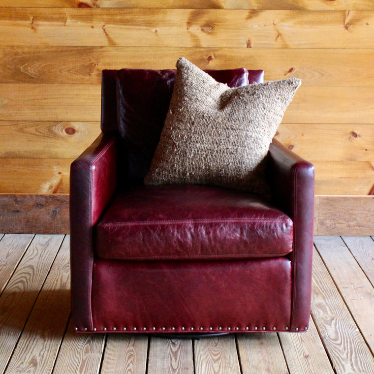 Marcy Swivel Chair in Oxblood Leather